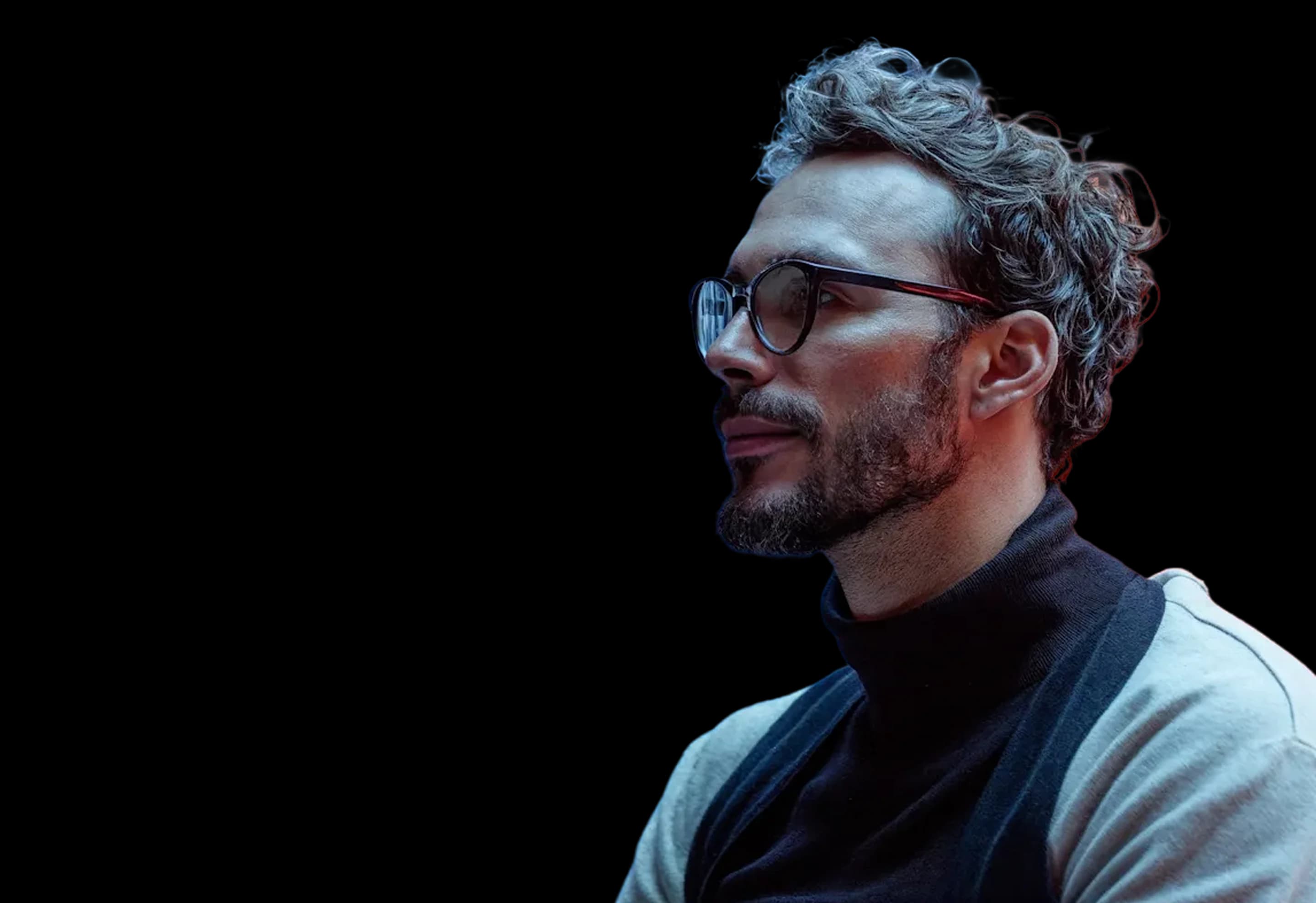 Contemplative man against vibrant background